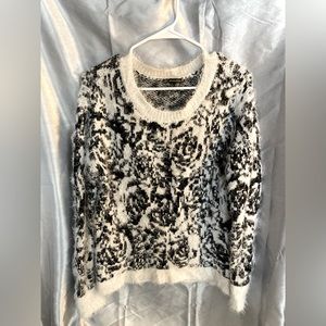 Size medium, fuzzy knit.